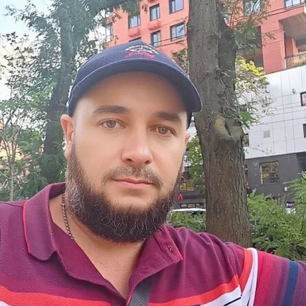 Николай